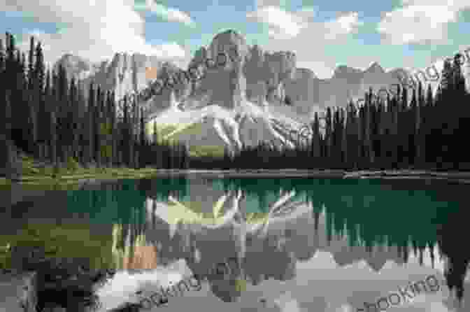 A Serene Image Of A Pristine Mountain Lake Surrounded By Towering Peaks A Road Running Southward: Following John Muir S Journey Through An Endangered Land