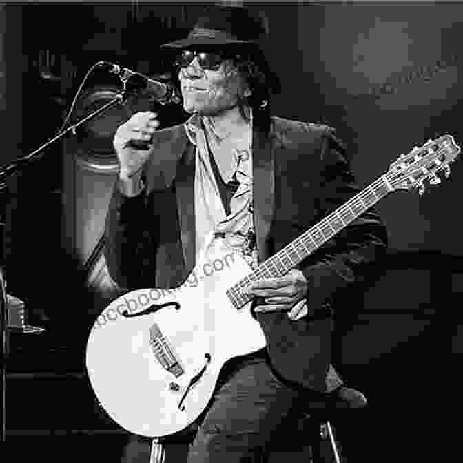 A Young Sixto Rodriguez Strumming A Guitar Sugar Man: The Life Death And Resurrection Of Sixto Rodriguez