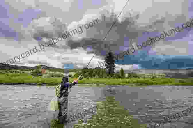 An Angler Casting A Line Into A Secluded Lake Surrounded By Lush Greenery And Towering Mountains Fishing The Wild Waters: An Angler S Search For Peace And Adventure In The Wilderness