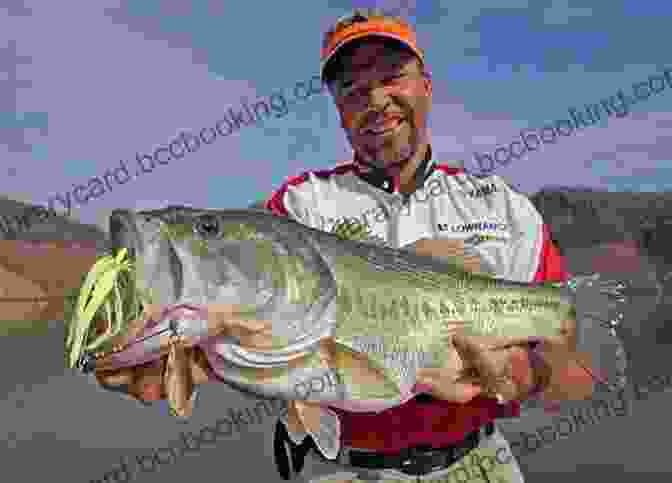 Angler Holding A Largemouth Bass Caught In Arkansas Flyfisher S Guide To Missouri/Arkansas